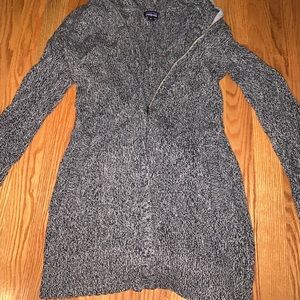 Women’s knit sweater with hood. Zip up